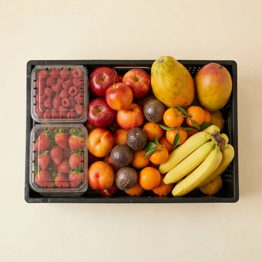 Luxe Box van bovenaf met passievruchten, mandarijnen en nectarines